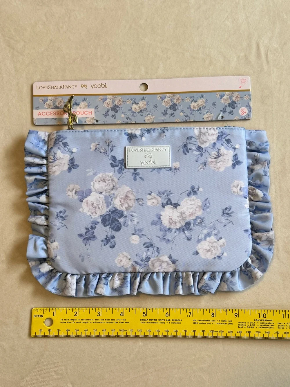 LoveShackFancy Blue Floral Ruffle Accessory Pouch.